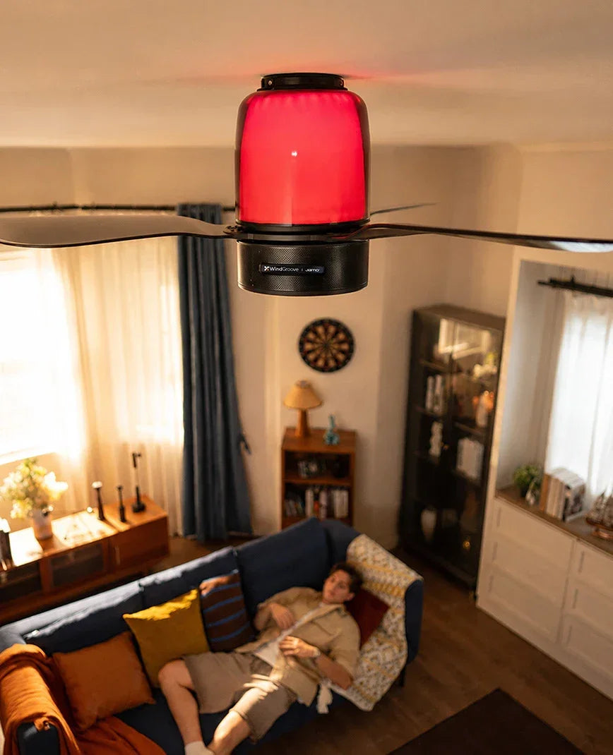 Ceiling fan with built-in lighting and an integrated speaker system.